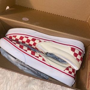 Red checkerboard vans.